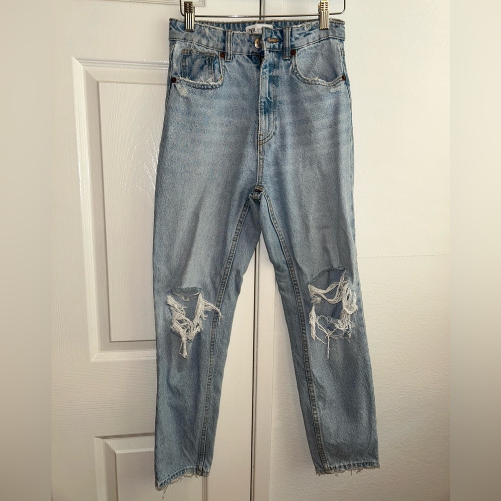 Distressed blue denim straight jeans